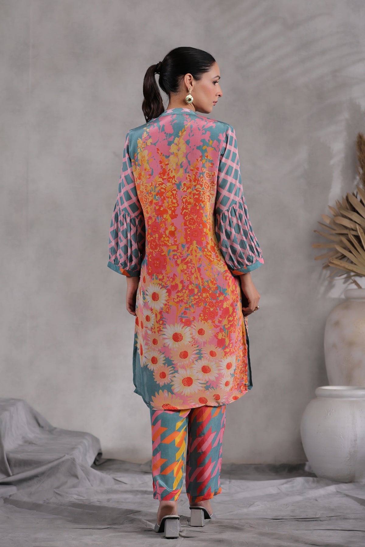 Multicoloured blooming kurta set with spread delicate sequence and thread work
