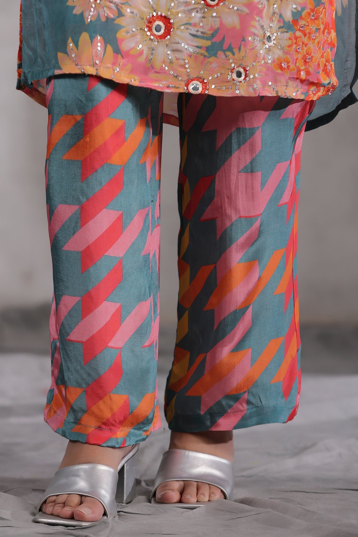 Multicoloured blooming kurta set with spread delicate sequence and thread work