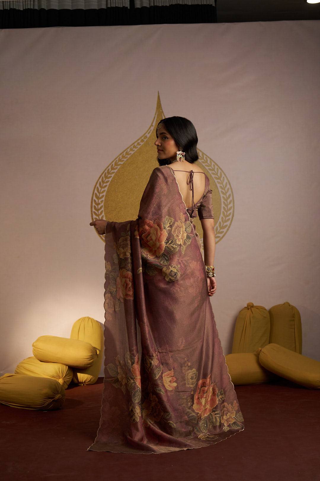 Brown shimmer tissue with scallope border and Zari sequence embellishment saree