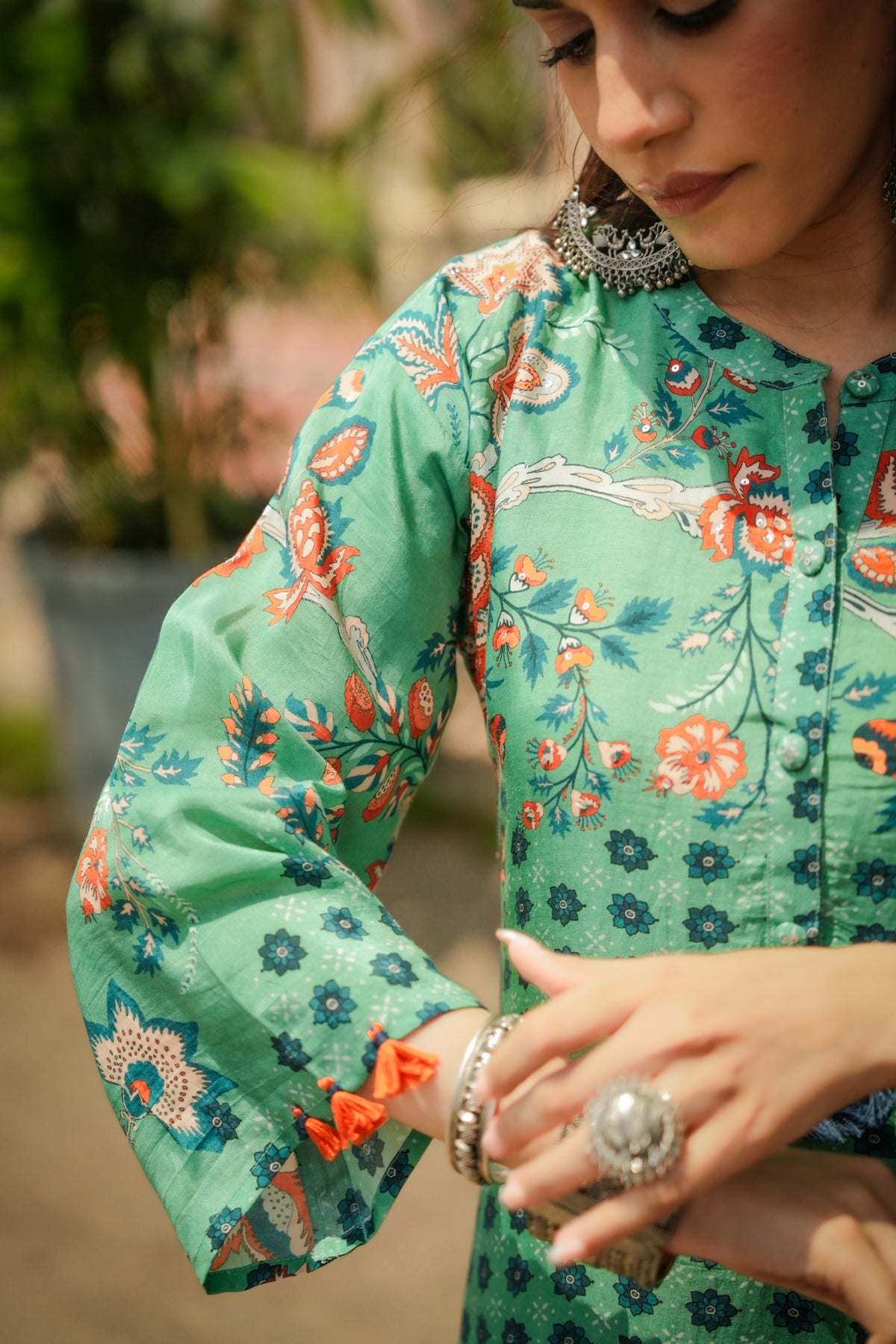 Green and Blue Pure Muslin Block and Floral Placement Print with Tassels Kurta Set