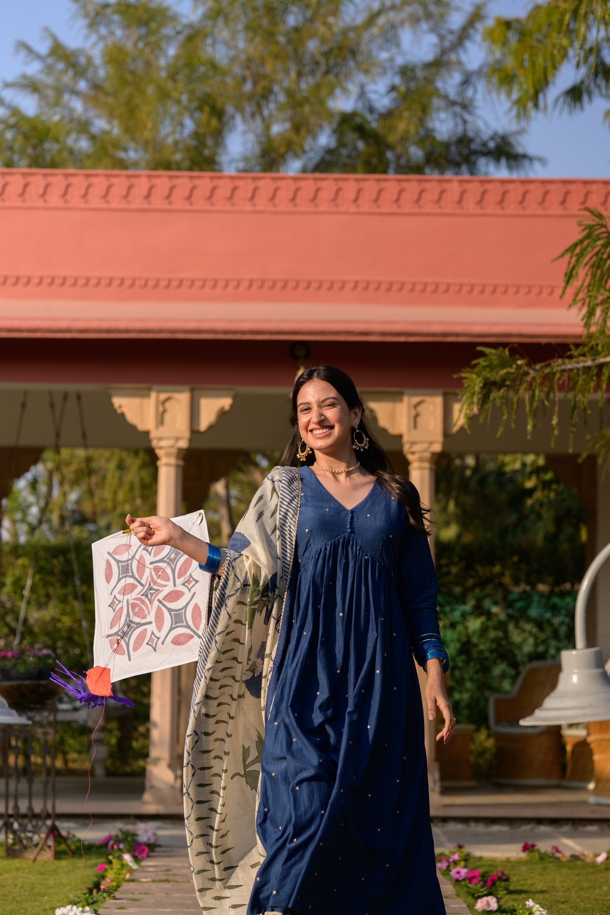 Falaq Naaz in  Blue Mul Chanderi Alia Cut With Spread Mirror work and Block Print Dupatta Suit Set
