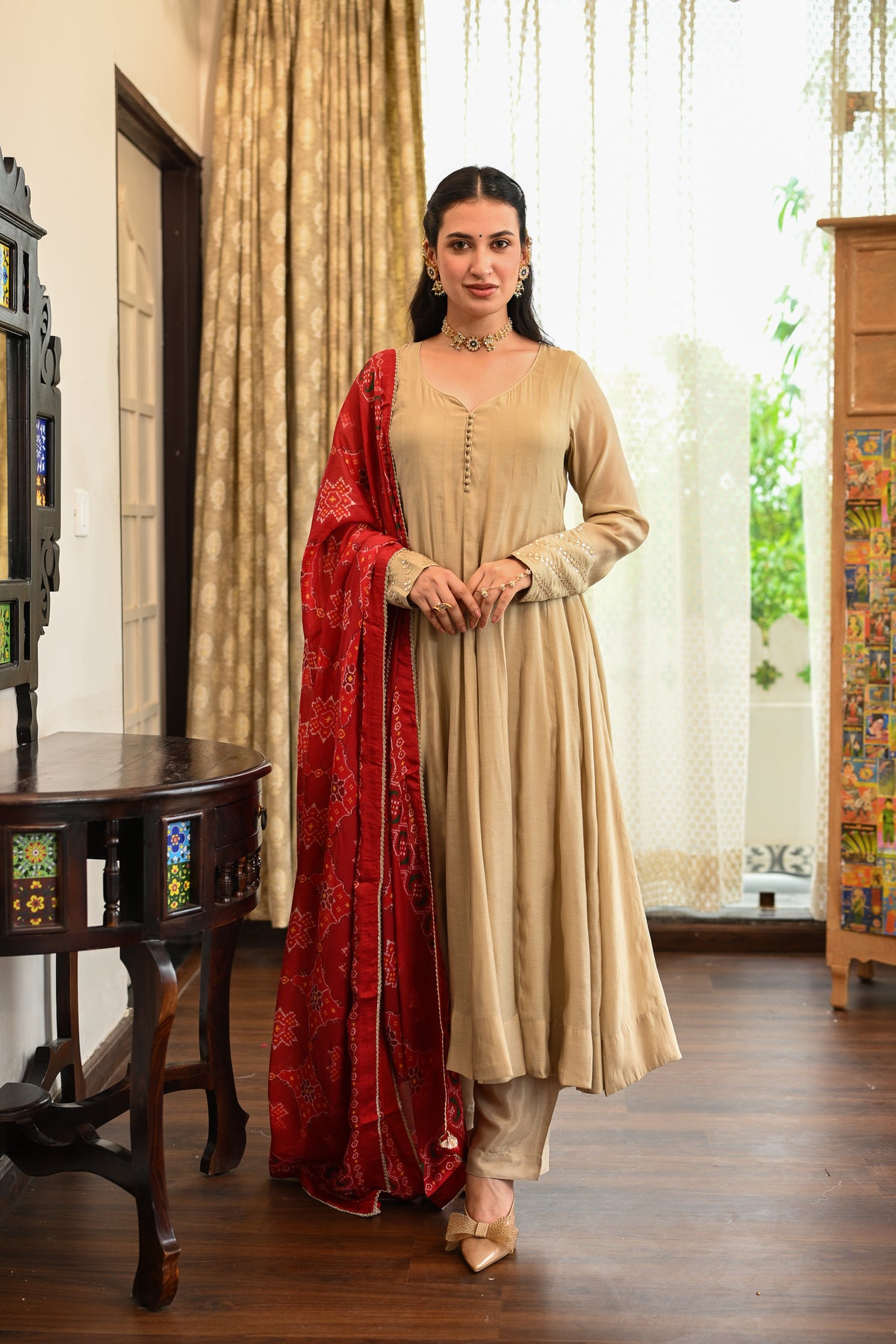 Beige Mul Chanderi with Red Patola Dupatta with Gota Work on Sleeves Suit Set