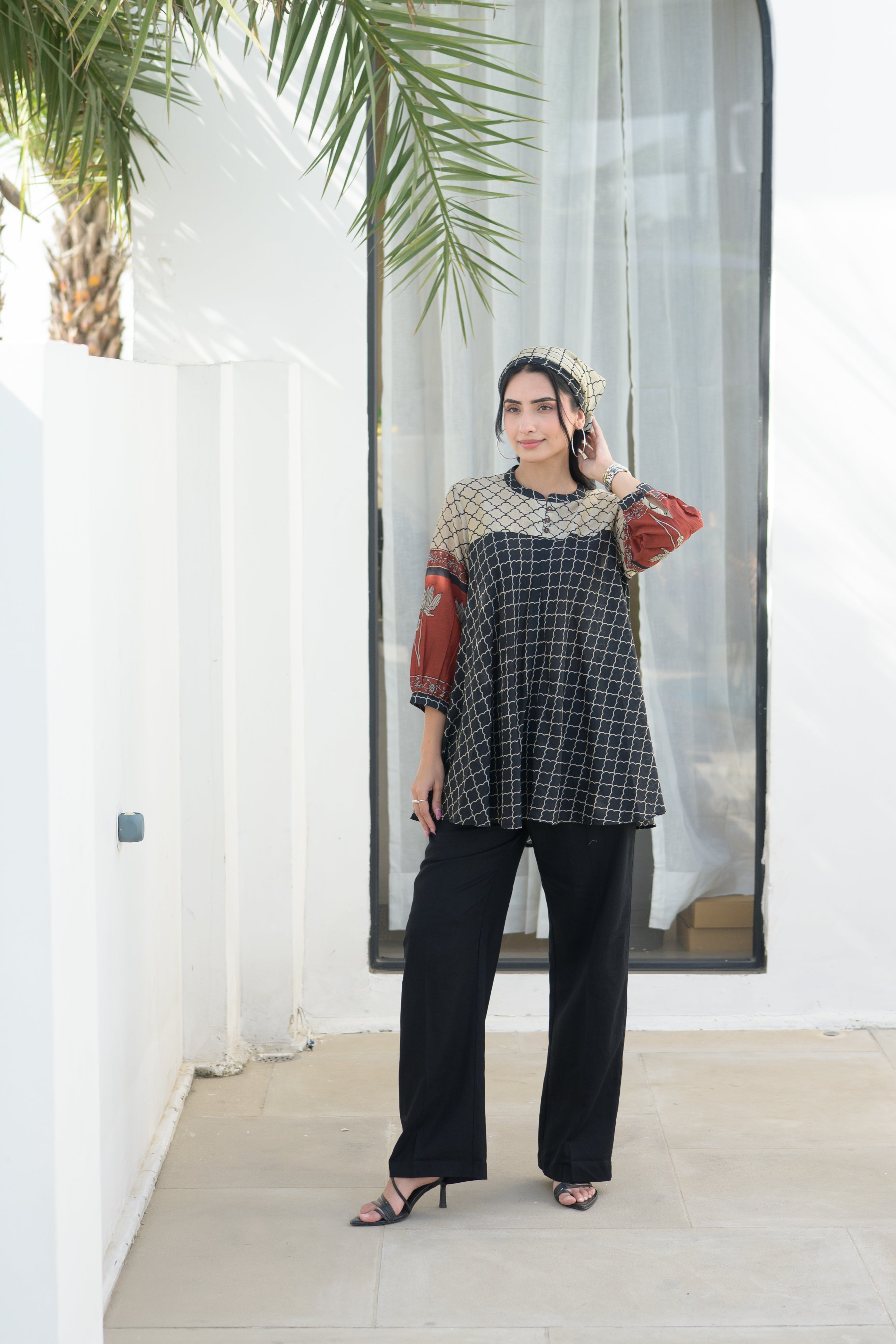 Black & Rust Jaal Print Peplum Top with Lotus Sleeves