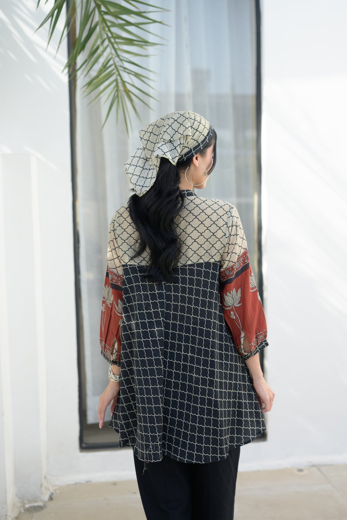 Black & Rust Jaal Print Peplum Top with Lotus Sleeves