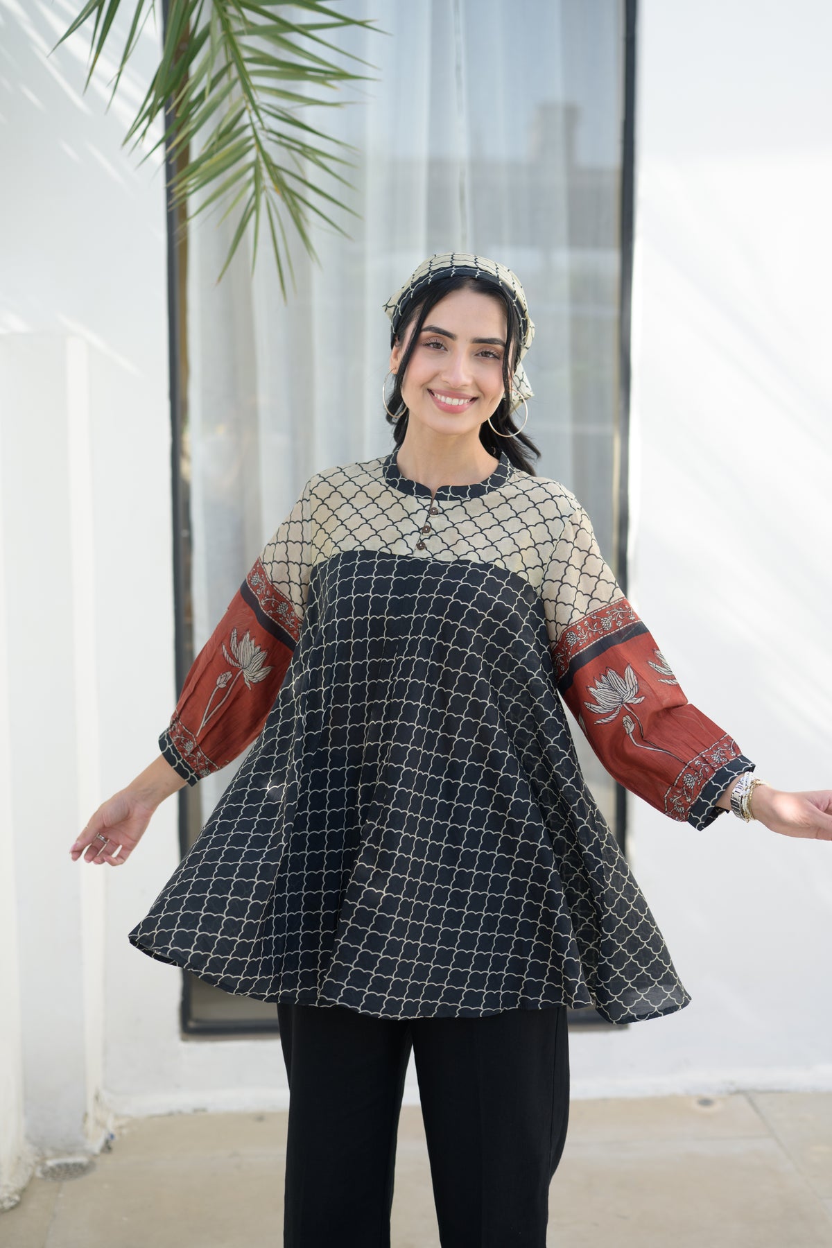 Black & Rust Jaal Print Peplum Top with Lotus Sleeves