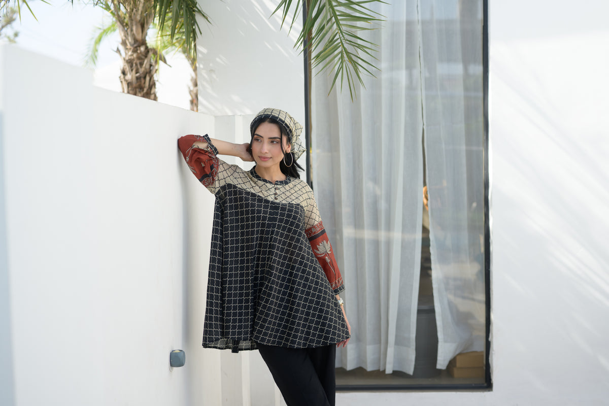 Black & Rust Jaal Print Peplum Top with Lotus Sleeves