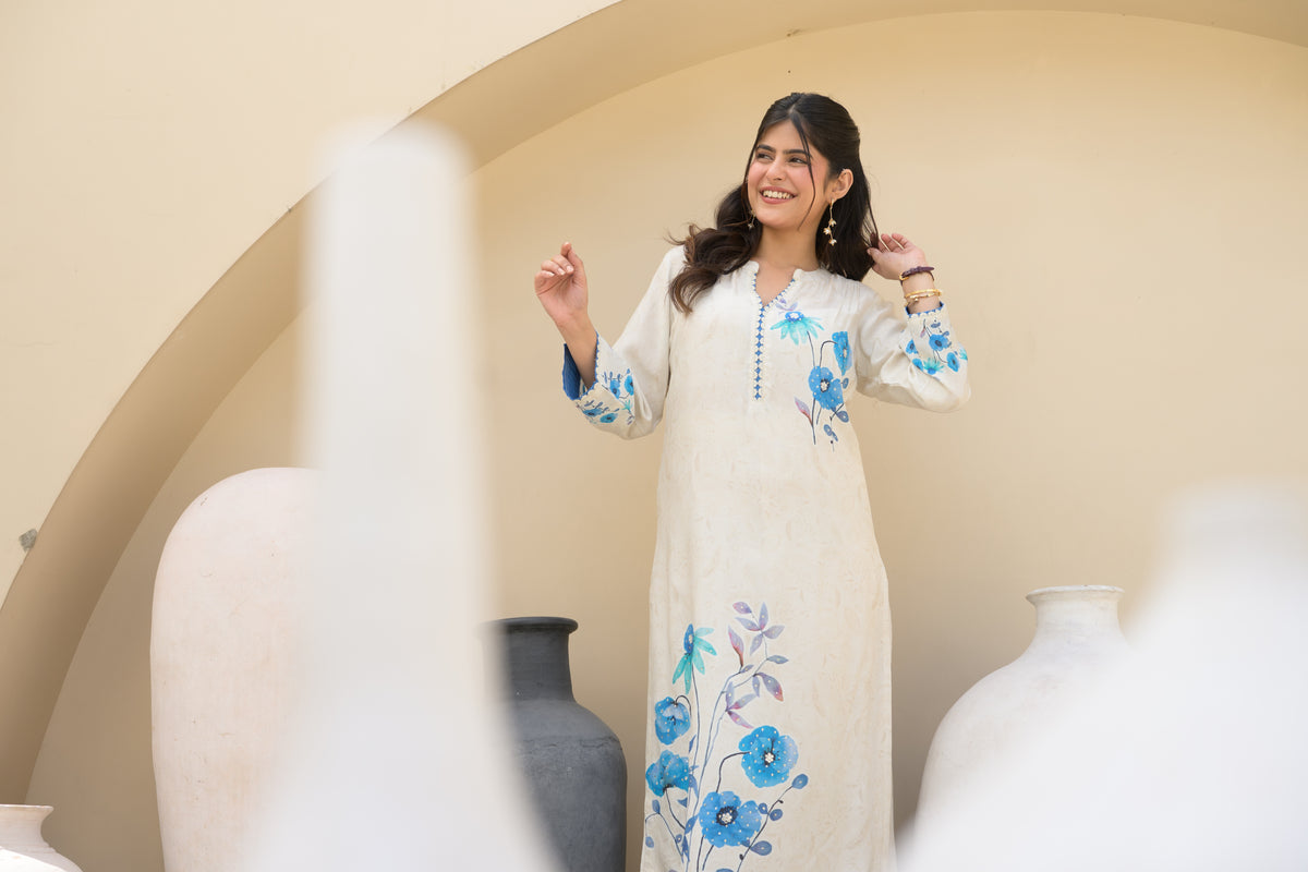 Off White Blue Floral Placement with Sequence and Tari work Muslin Kurta Set