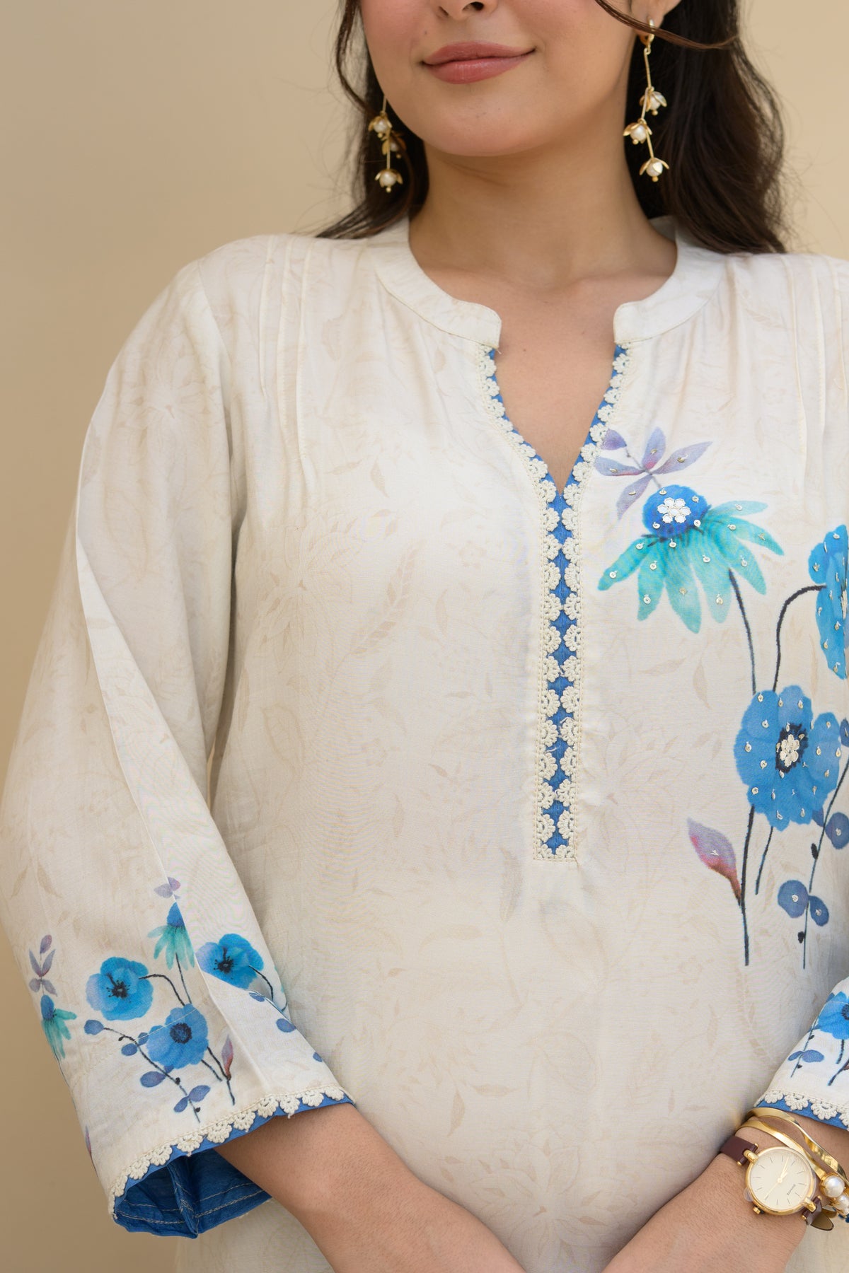 Off White Blue Floral Placement with Sequence and Tari work Muslin Kurta Set