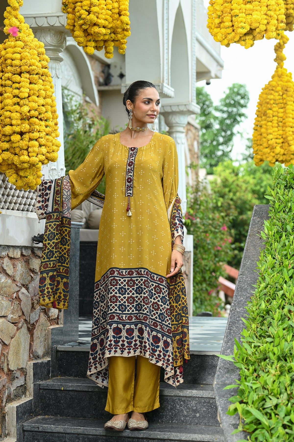 Mustard and blue ajrakh print sequence work A line suit set with chinnon ajrakh print dupatta
