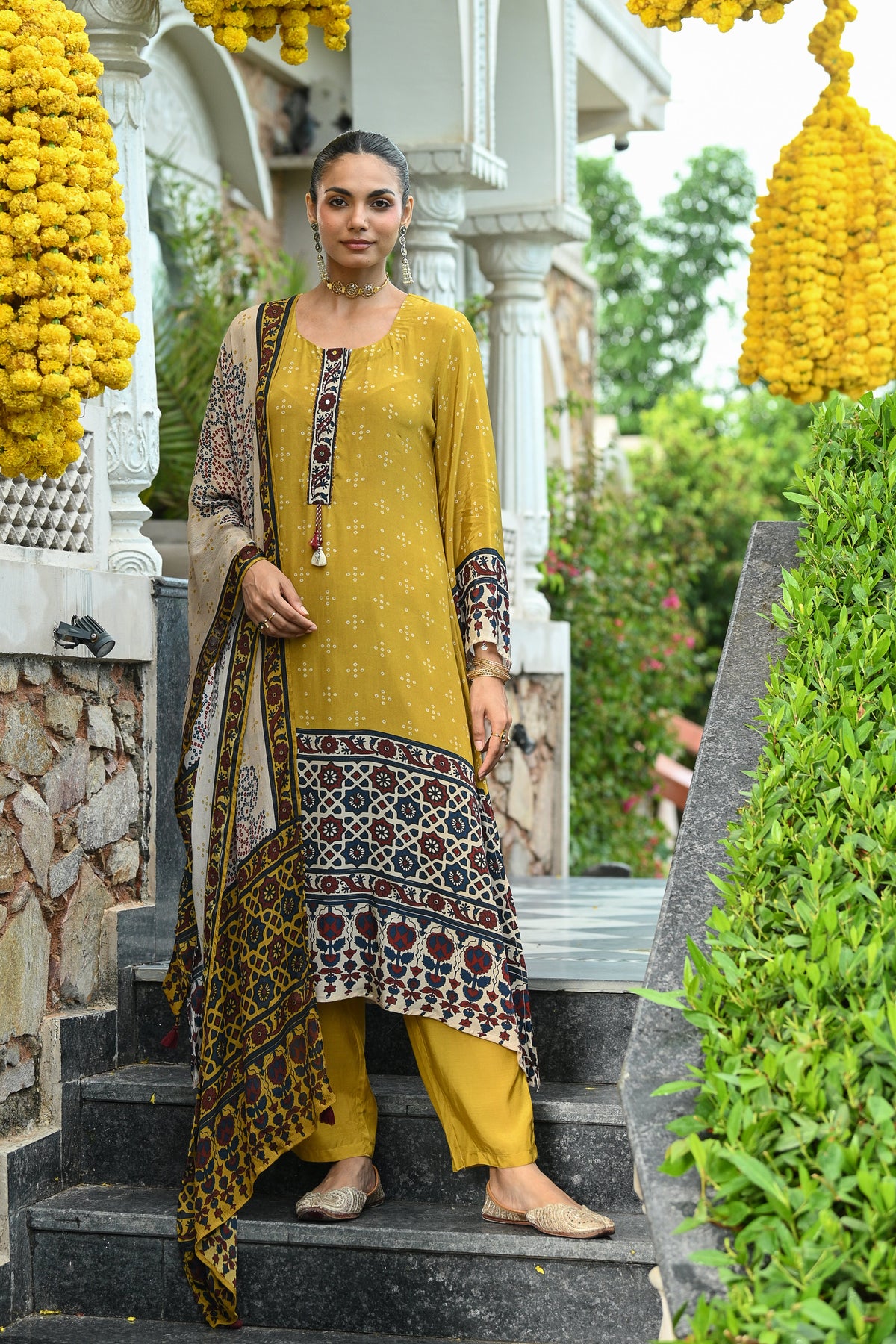 Mustard and blue ajrakh print sequence work A line suit set with chinnon ajrakh print dupatta