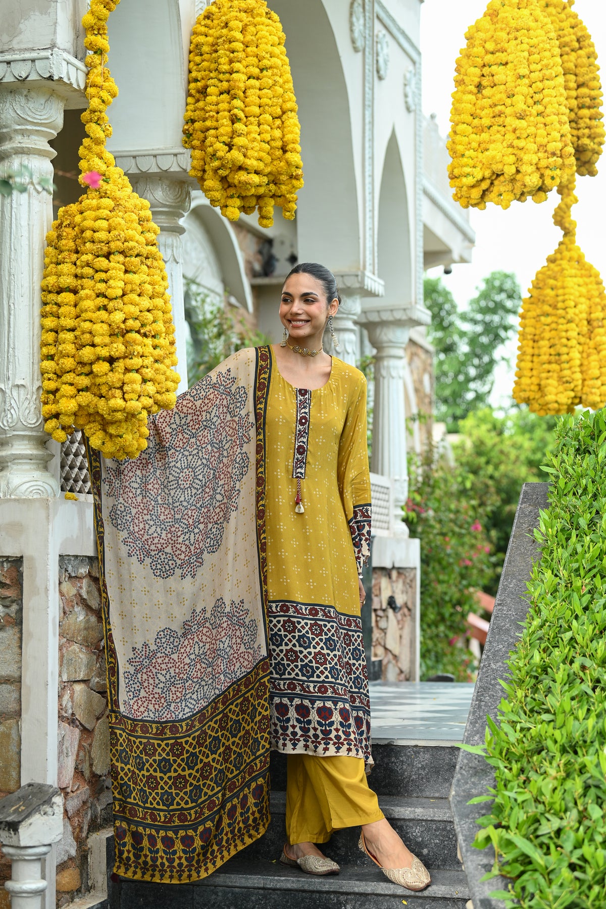 Mustard and blue ajrakh print sequence work A line suit set with chinnon ajrakh print dupatta