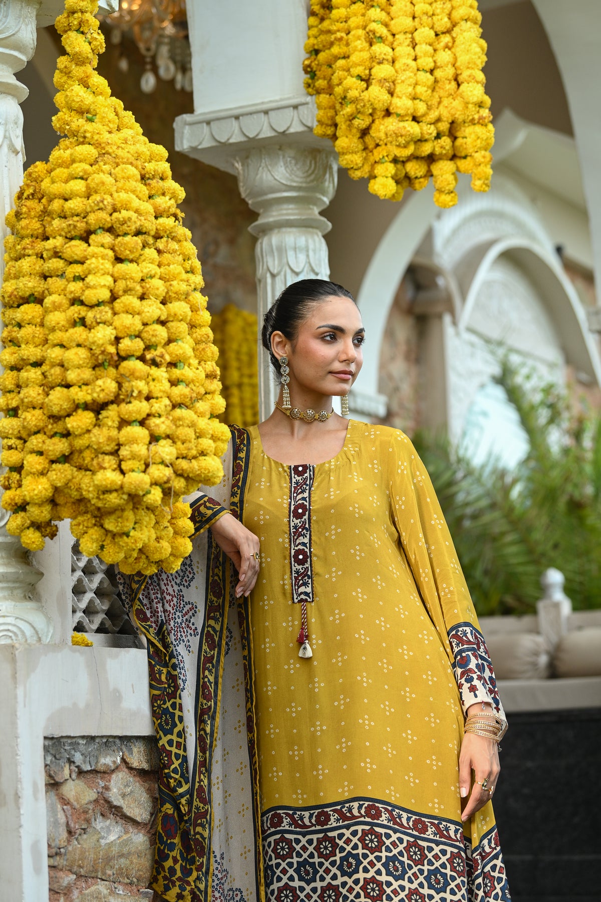 Mustard and blue ajrakh print sequence work A line suit set with chinnon ajrakh print dupatta