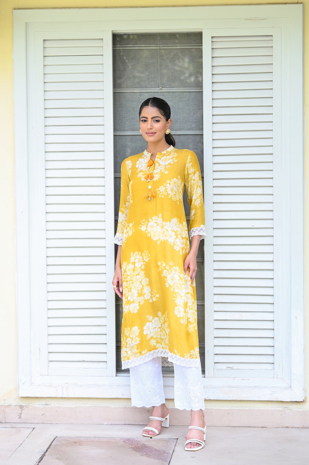 Kiara Advani in Yellow Bloom Muslin Kurti with Alluring lace and Schiffli pants