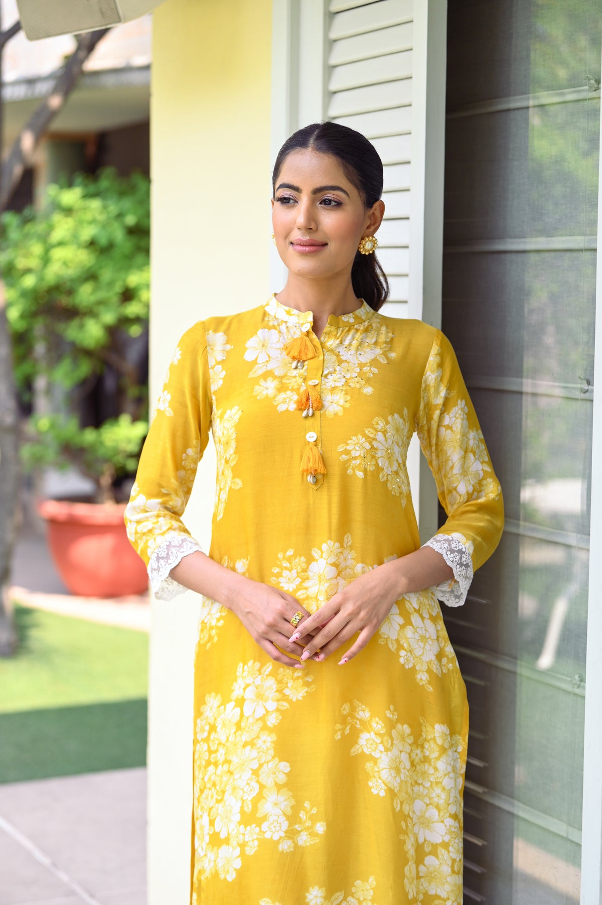 Kiara Advani in Yellow Bloom Muslin Kurti with Alluring lace and Schiffli pants