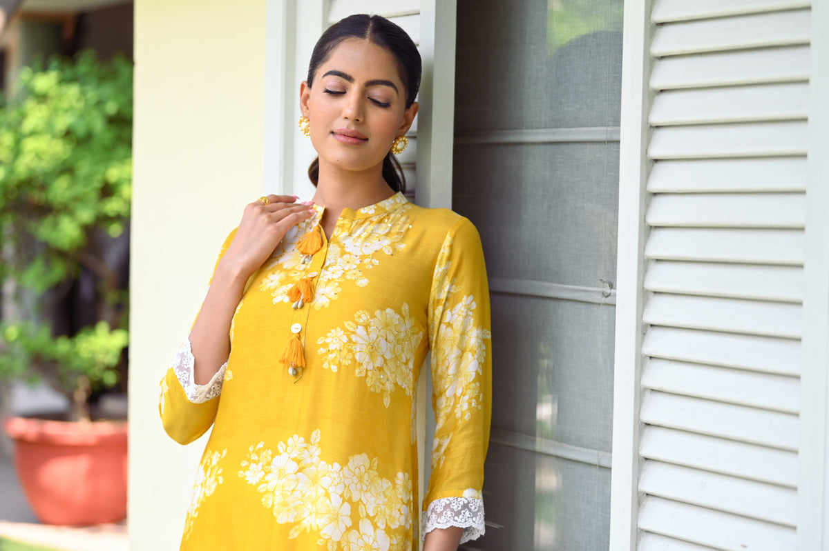 Kiara Advani in Yellow Bloom Muslin Kurti with Alluring lace and Schiffli pants