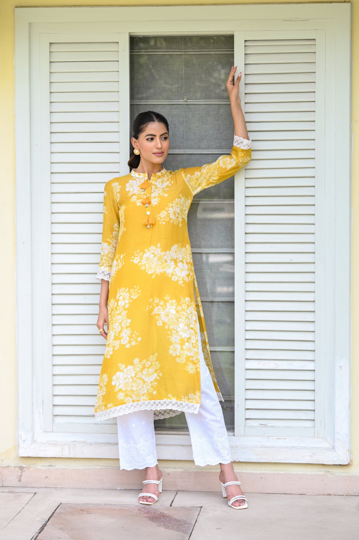 Kiara Advani in Yellow Bloom Muslin Kurti with Alluring lace and Schiffli pants