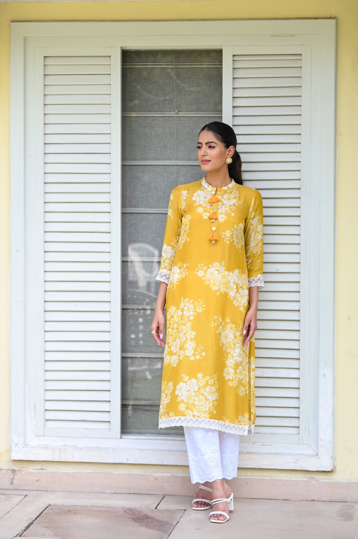 Kiara Advani in Yellow Bloom Muslin Kurti with Alluring lace and Schiffli pants