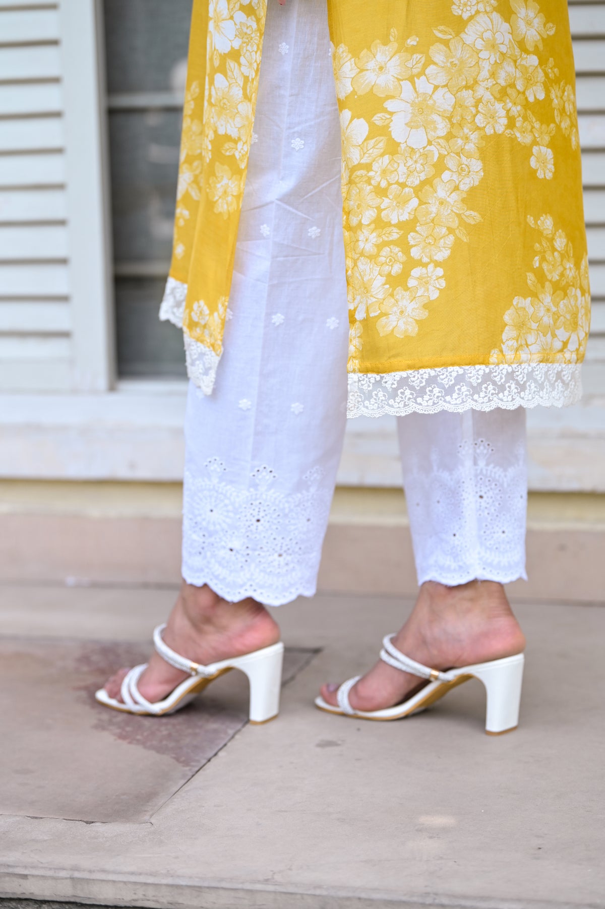 Kiara Advani in Yellow Bloom Muslin Kurti with Alluring lace and Schiffli pants