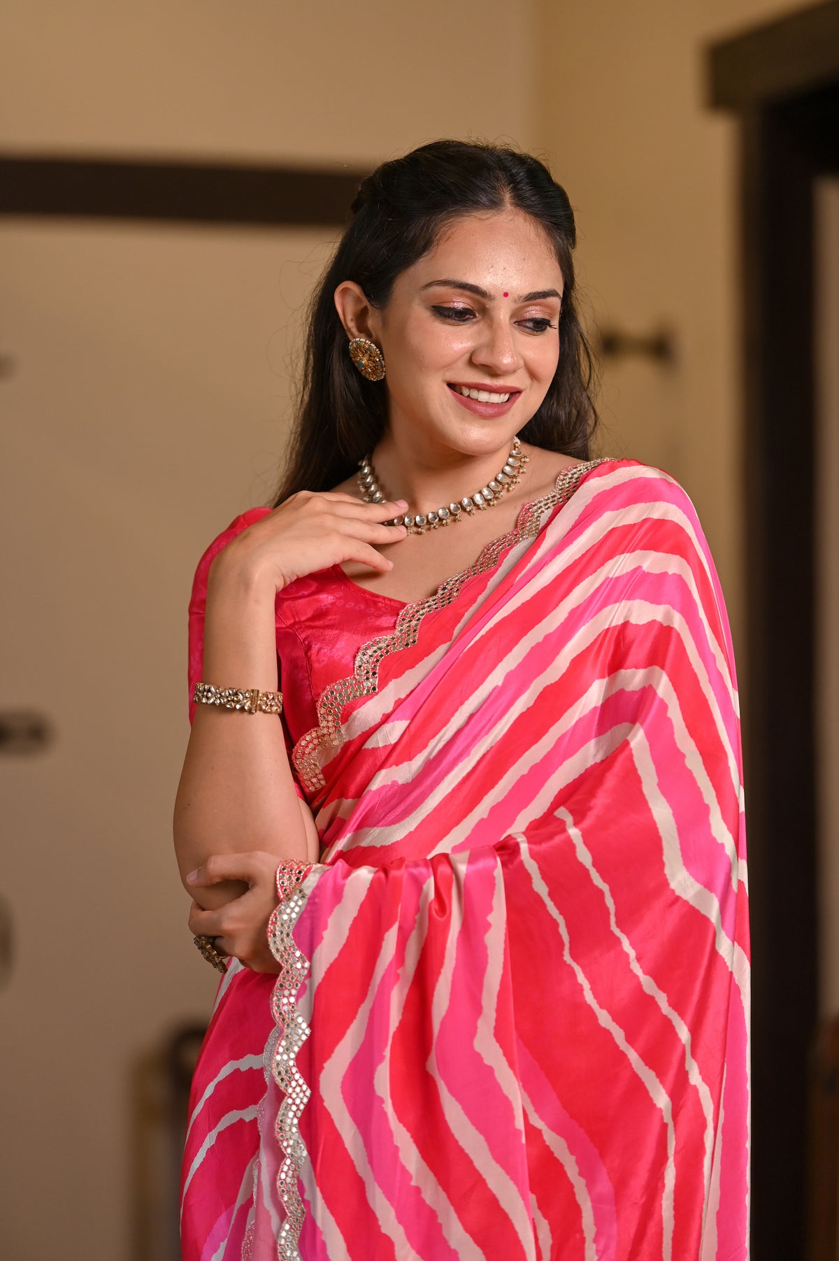 Shades of Pink Lehriya Crepe Saree with Scallop Mirror Work