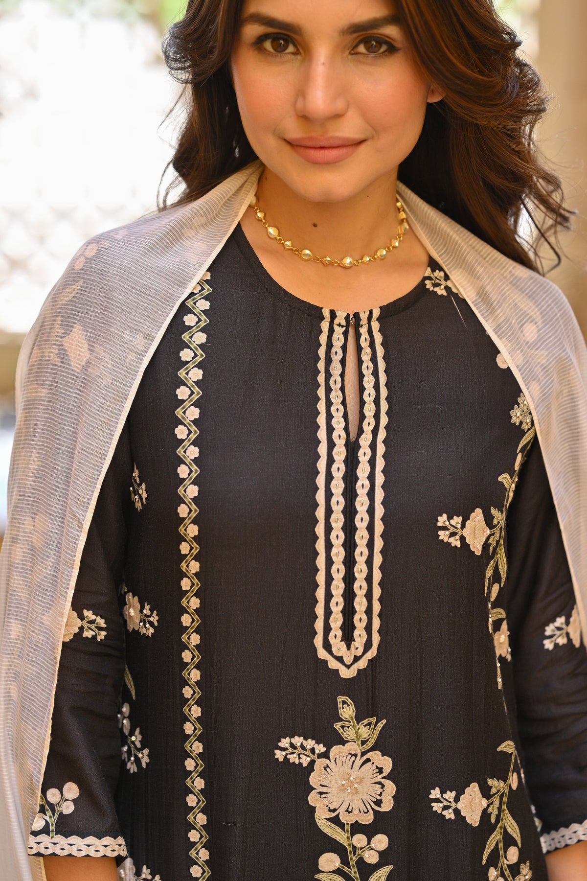 Soha Ali Khan in Black and Off White Placement Print Muslin Suit with Scallope Border