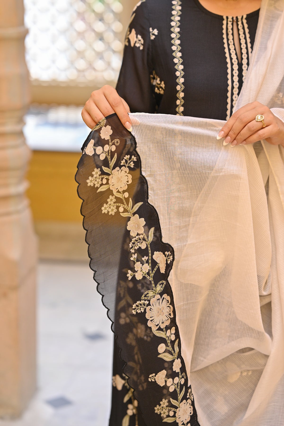Soha Ali Khan in Black and Off White Placement Print Muslin Suit with Scallope Border