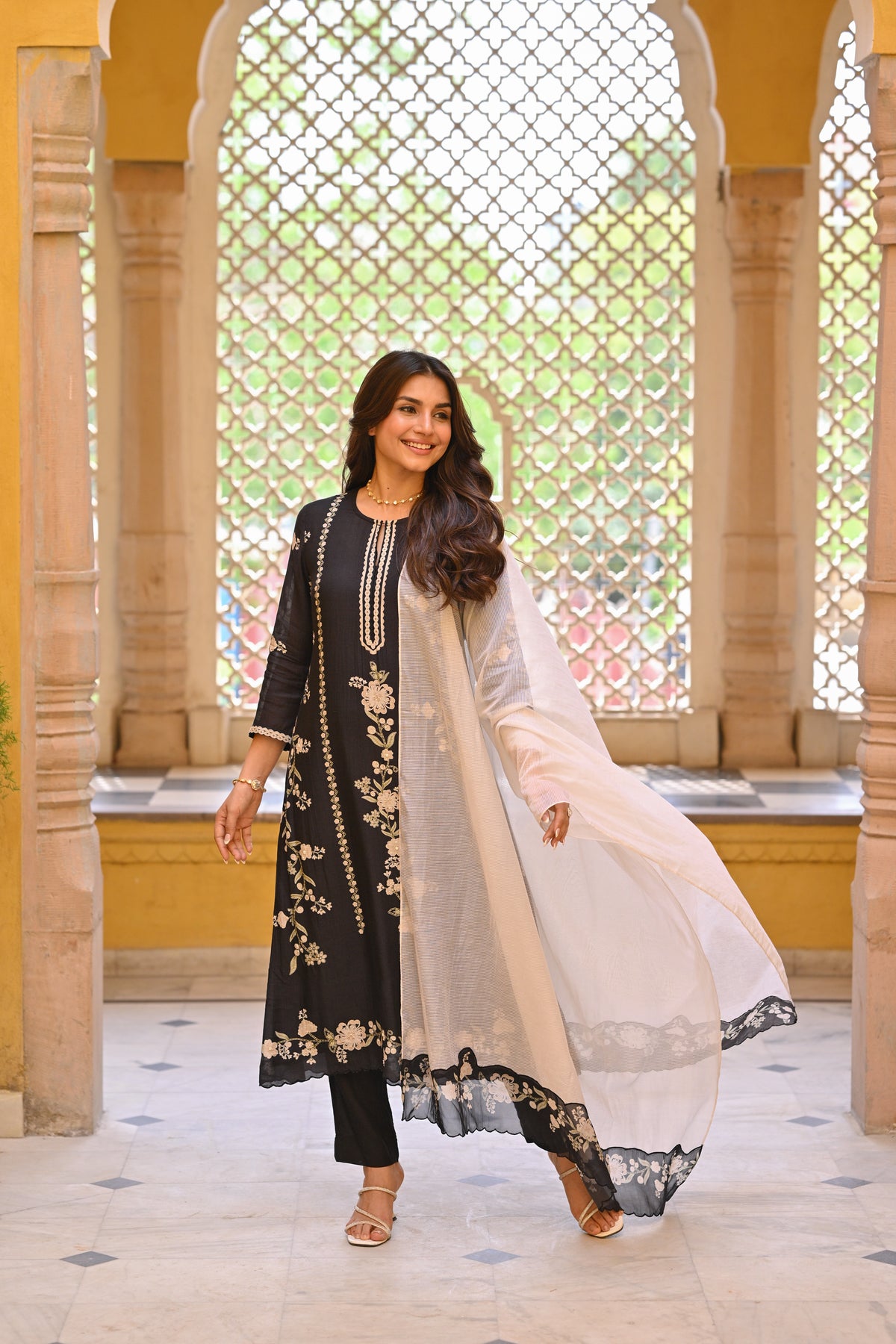 Soha Ali Khan in Black and Off White Placement Print Muslin Suit with Scallope Border