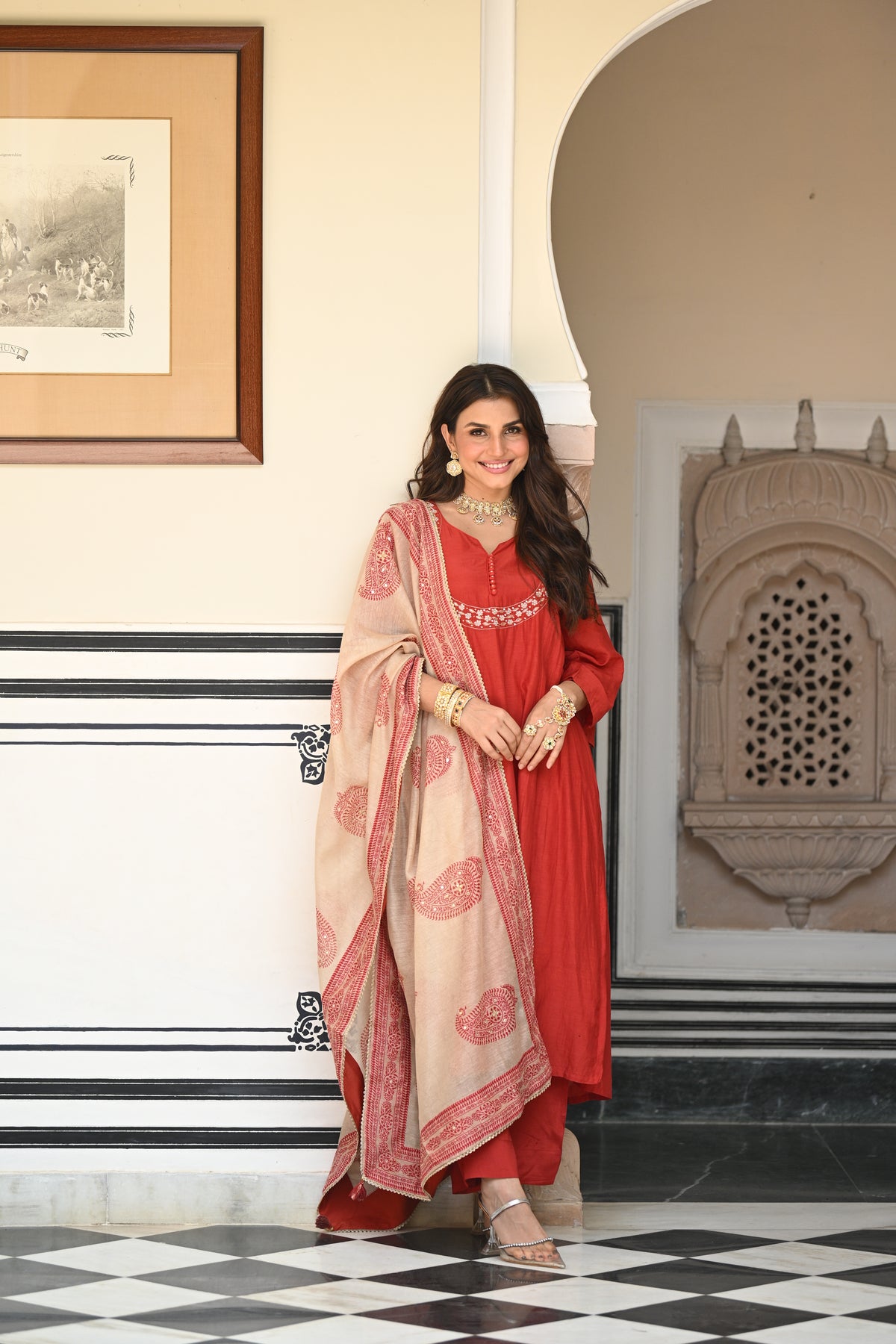 Rustic reddish mul chanderi suit set with beads and tari work on neck and block paisley with spread gota work dupatta
