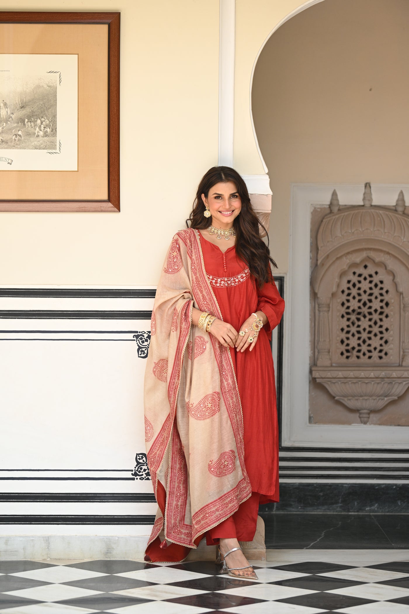 Rustic reddish mul chanderi suit set with beads and tari work on neck and block paisley with spread gota work dupatta