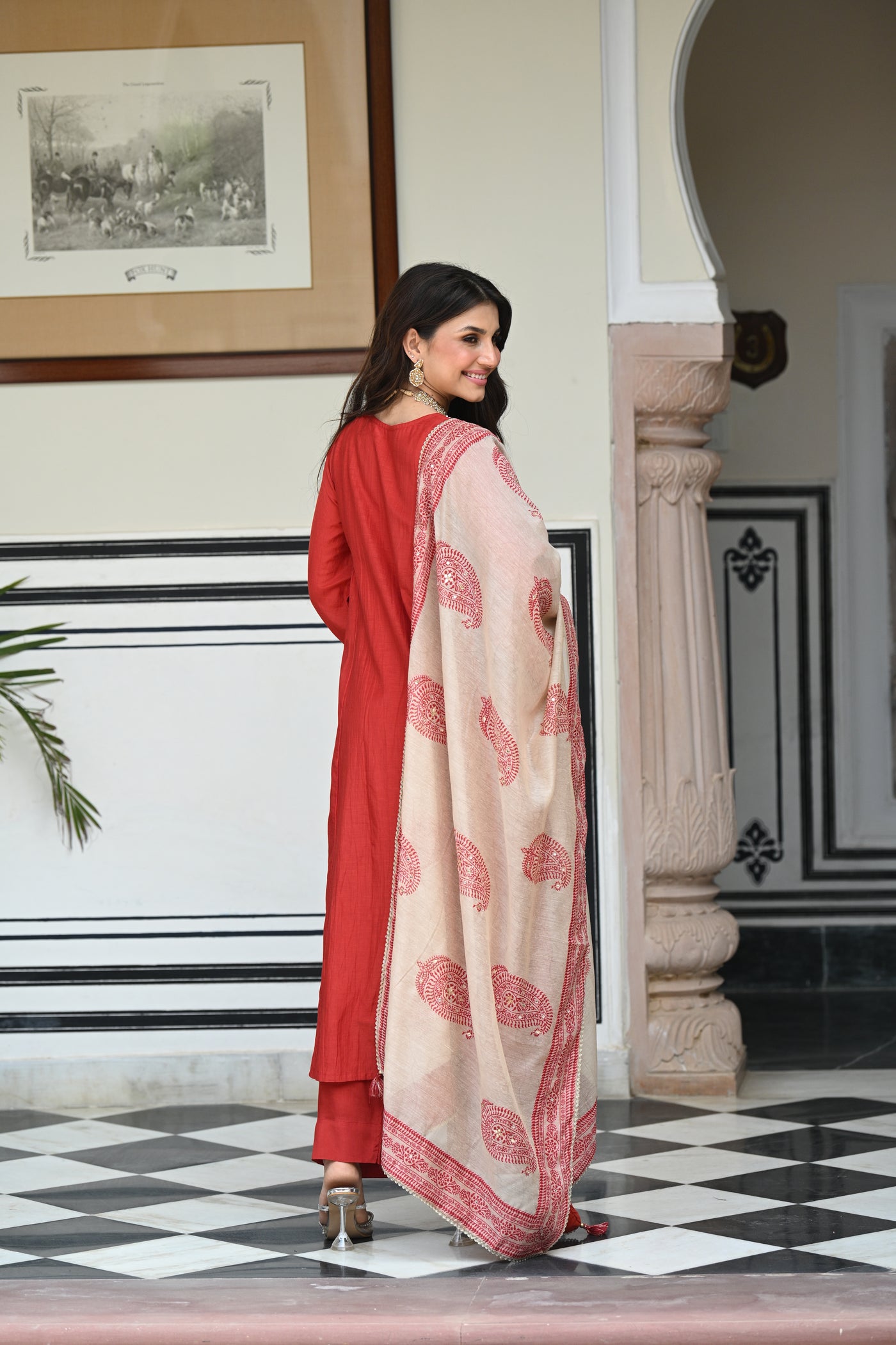 Rustic reddish mul chanderi suit set with beads and tari work on neck and block paisley with spread gota work dupatta