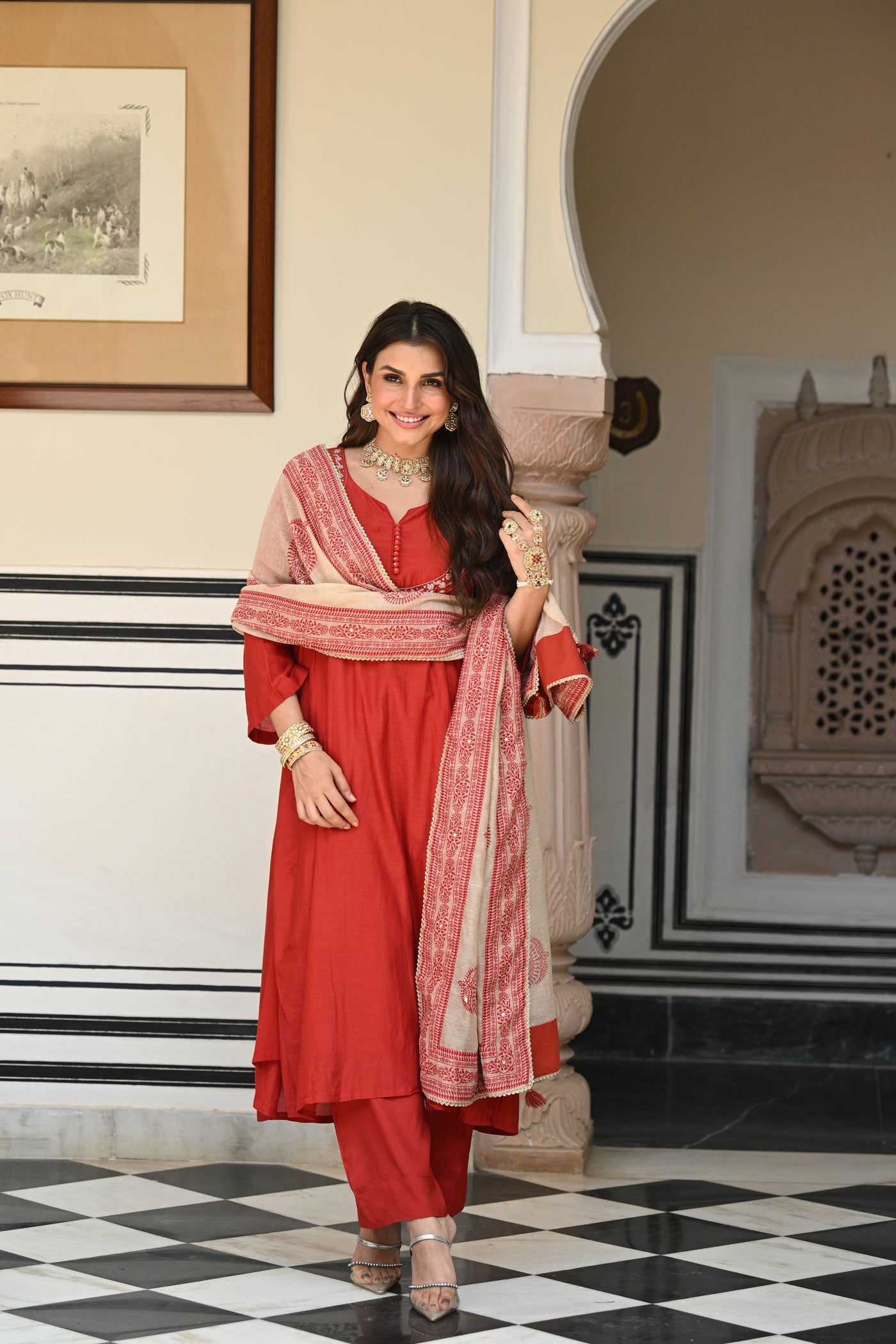 Rustic reddish mul chanderi suit set with beads and tari work on neck and block paisley with spread gota work dupatta