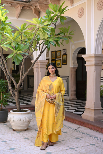 Yellow Shimmer Muslin with Threadwork motifs and Cut Work Scallop Suit Set