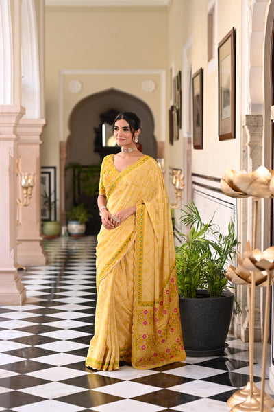 Yellow Bandhani With Patola Design Saree With Mirror Aari And Sequence Work