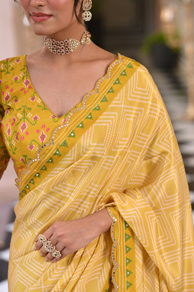 Yellow Bandhani With Patola Design Saree With Mirror Aari And Sequence Work