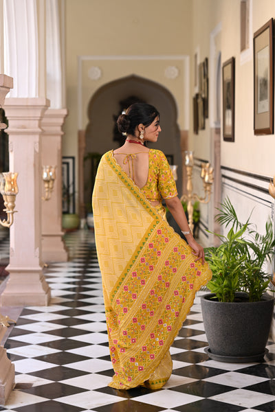 Yellow Bandhani With Patola Design Saree With Mirror Aari And Sequence Work
