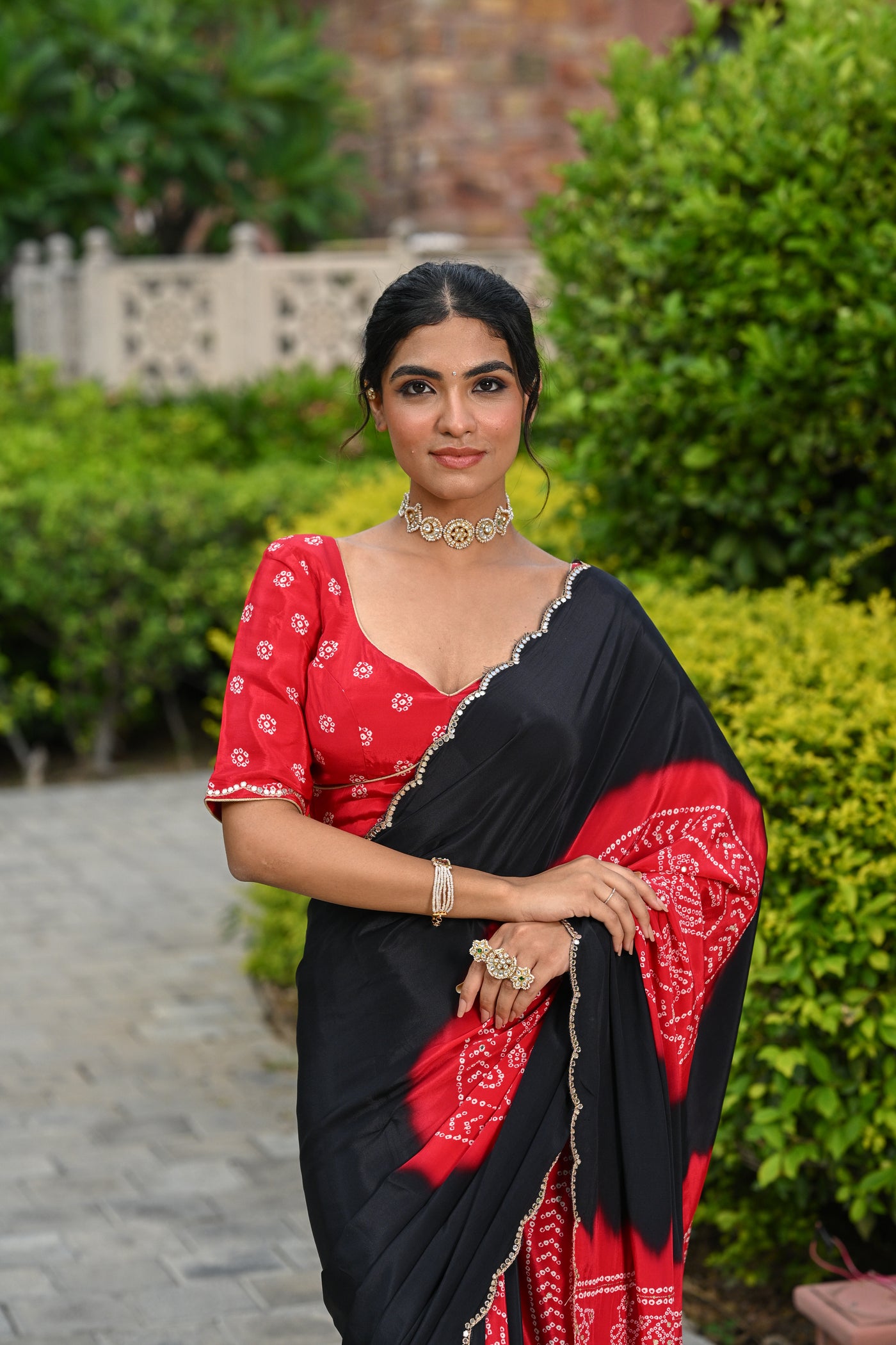 Black and Red Ghewar Print Crepe Saree with Aari and  Mirror Work and Scallop Border