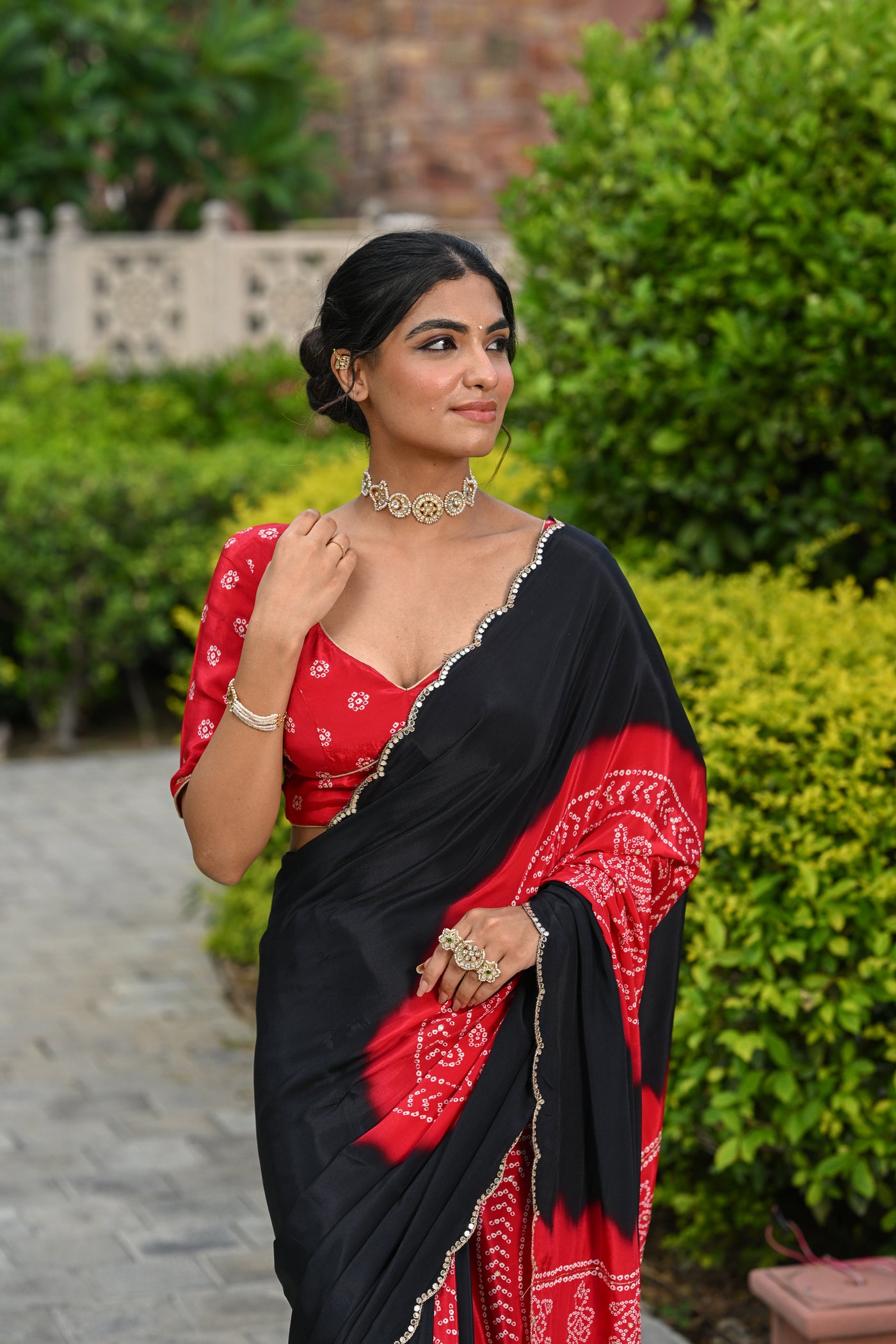 Black and Red Ghewar Print Crepe Saree with Aari and  Mirror Work and Scallop Border