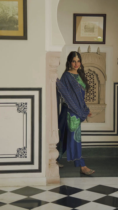 Blue and Green Shimmer Muslin with Threadle and Handwork on Kurta with Silver & Golden Zari dupatta with Four side Threadle, Patch Work & Handwork Scallope Suit Set