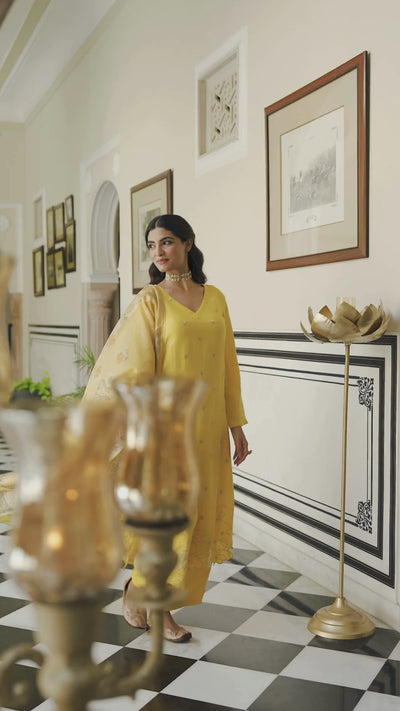 Yellow Shimmer Muslin with Threadwork motifs and Cut Work Scallop Suit Set